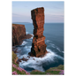 Red sandstone sea stack at last light with white water swirling at its base, unframed print