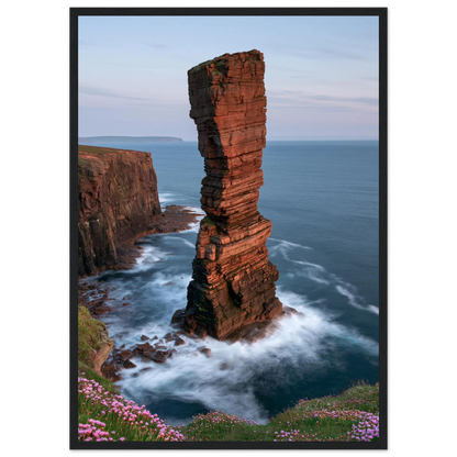 Red sandstone sea stack at last light above an Atlantic cliff coast, print in a black frame