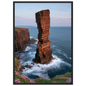 Red sandstone sea stack at last light above an Atlantic cliff coast, print in a black frame