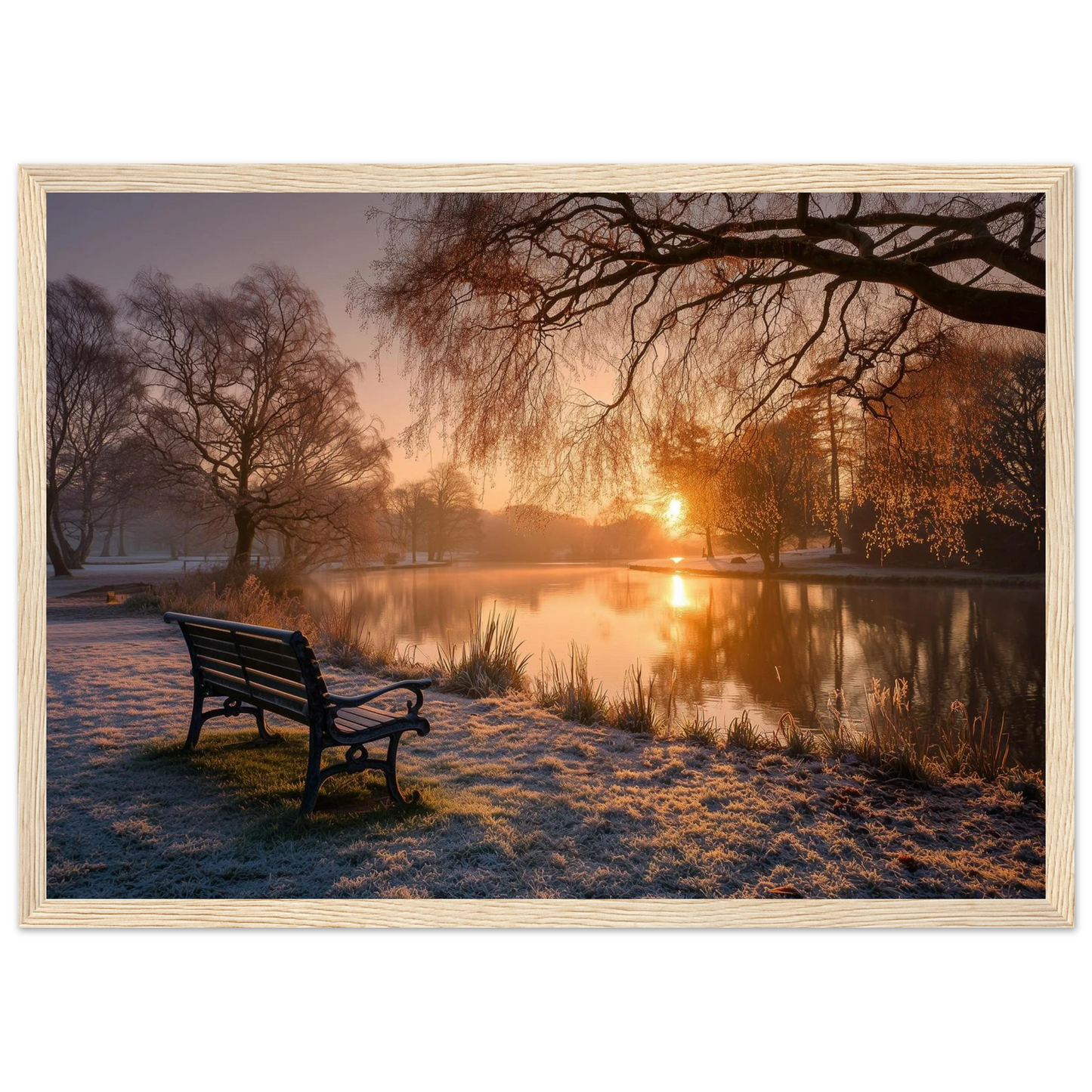 Frosted park lake at winter sunrise with an empty bench on the bank, print in a natural light wood frame