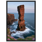 Red sandstone sea stack at last light above an Atlantic cliff coast, print in a black frame