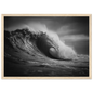 Black and white wave print in a light oak frame with a wide mount