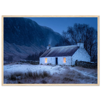Highland winter cottage scene in a light oak frame