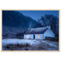 Highland winter cottage scene in a light oak frame