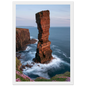 Red sandstone sea stack at last light above an Atlantic cliff coast, print in a white frame