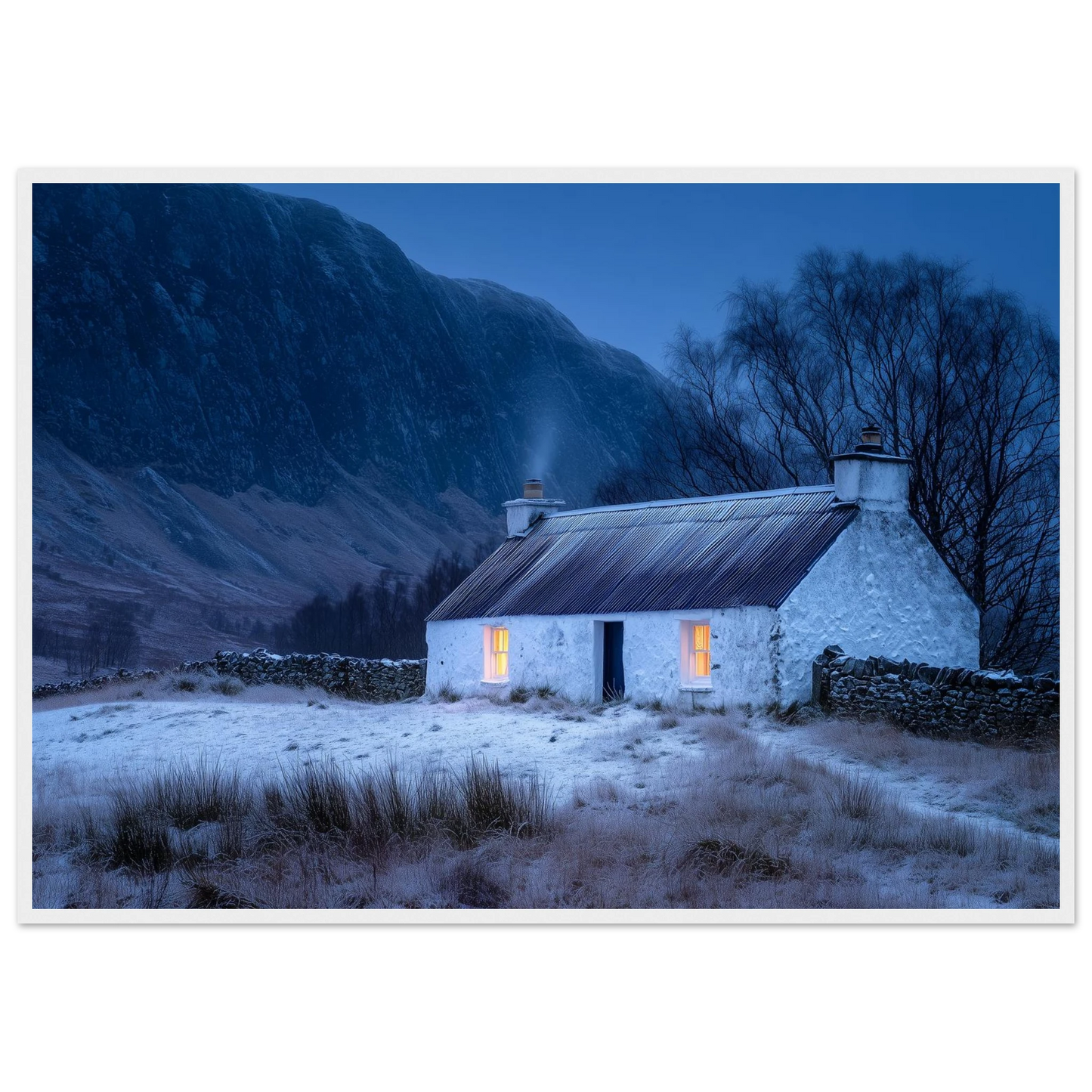 Scottish snow scene with a lit cottage, print in a white frame