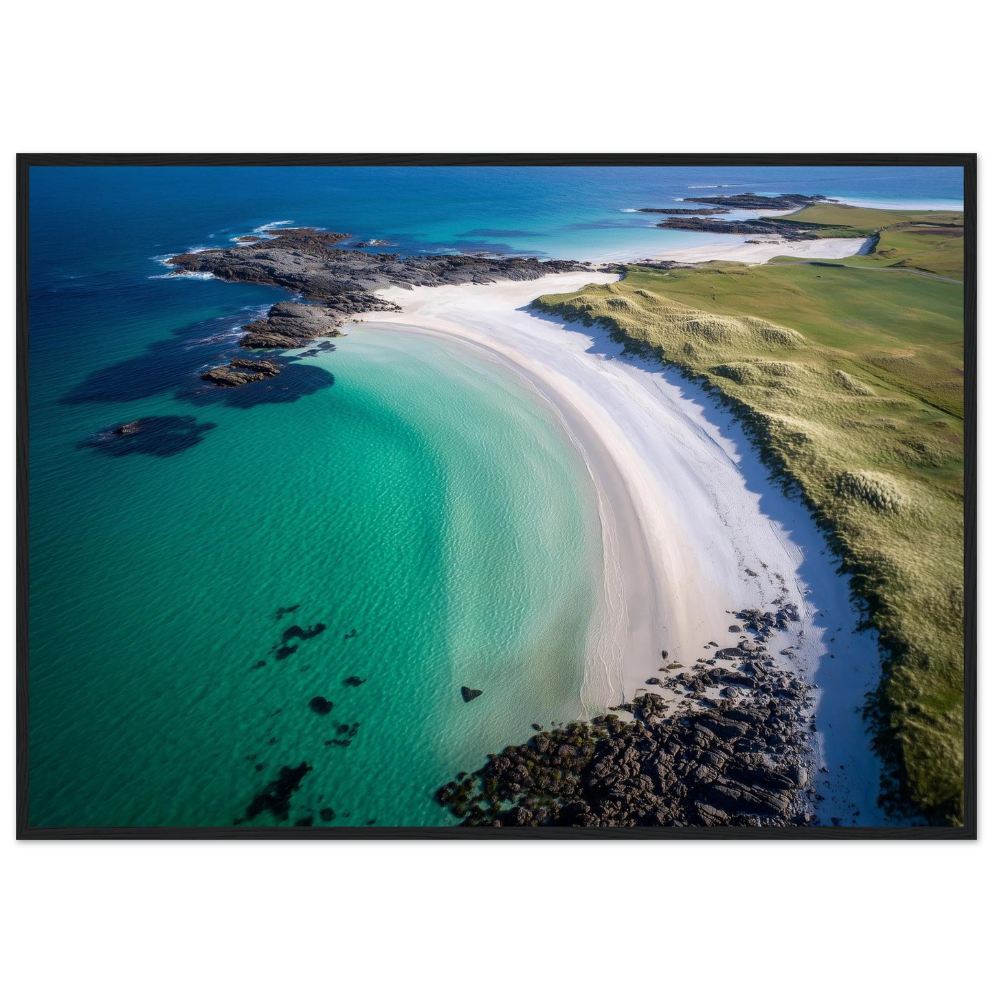 Turquoise water and white sand on a Scottish island shore, print in a dark frame