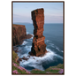 Red sandstone sea stack at last light above an Atlantic cliff coast, print in a dark brown wood frame