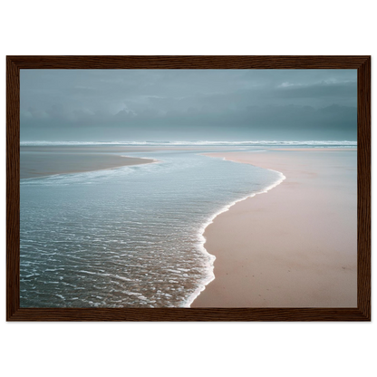 Empty beach and thin surf line, framed in dark brown wood with a wide mount