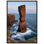 Red sandstone sea stack at last light above an Atlantic cliff coast, print in a dark brown wood frame