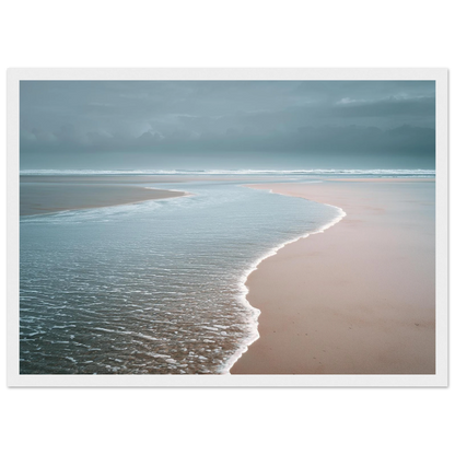 Calm tide line under a soft grey sky, framed in white with a wide mount
