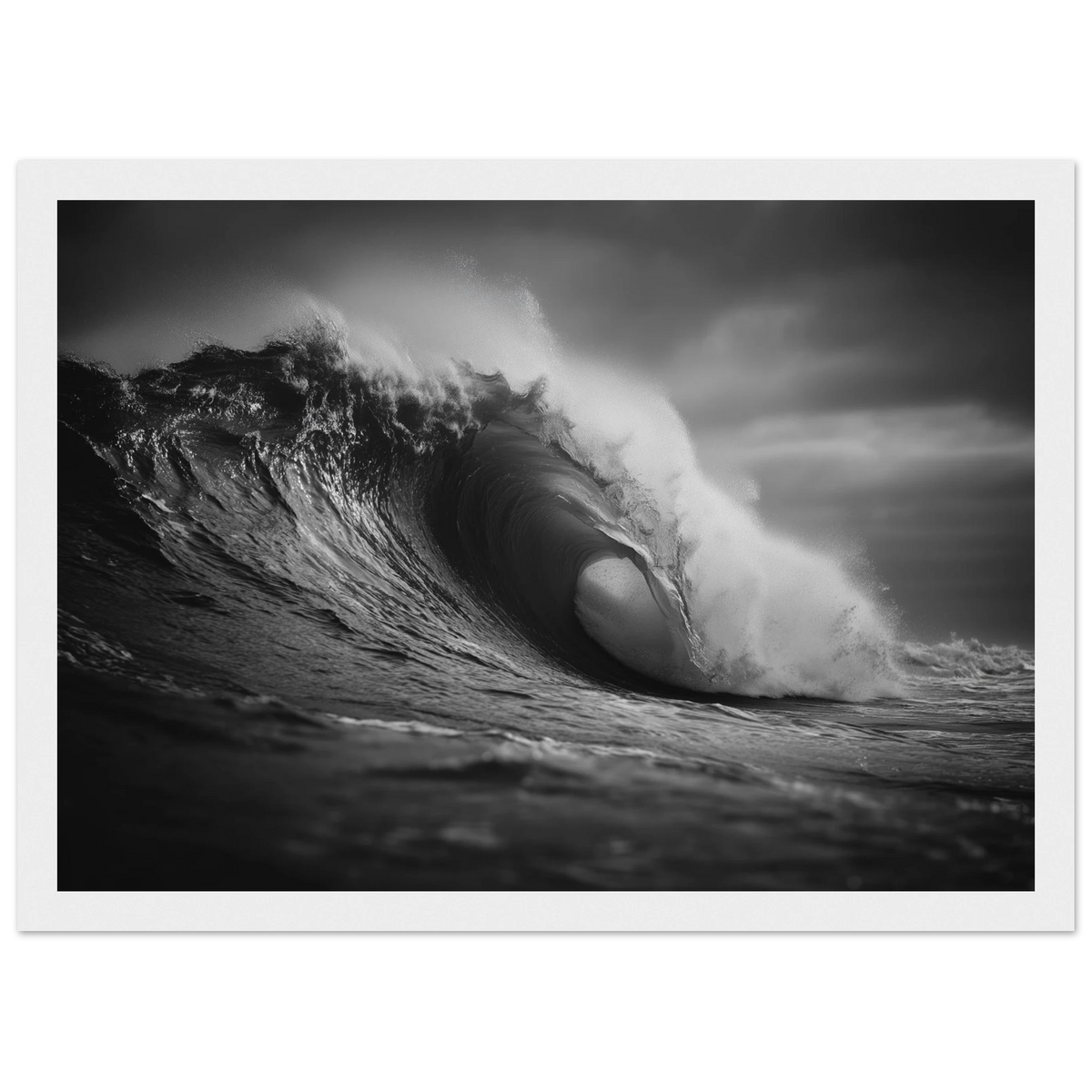 Curling wave in black and white, framed in white with a wide mount
