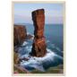 Red sandstone sea stack at last light above an Atlantic cliff coast, print in a natural light wood frame