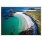 Aerial coastal scene in turquoise, white and green, print in a dark frame