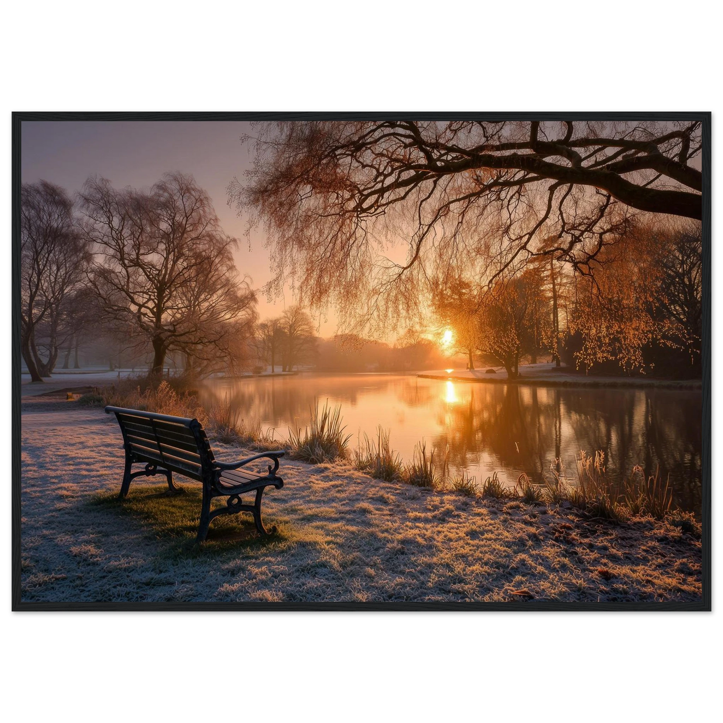 Frosted park lake at winter sunrise with an empty bench on the bank, print in a black frame