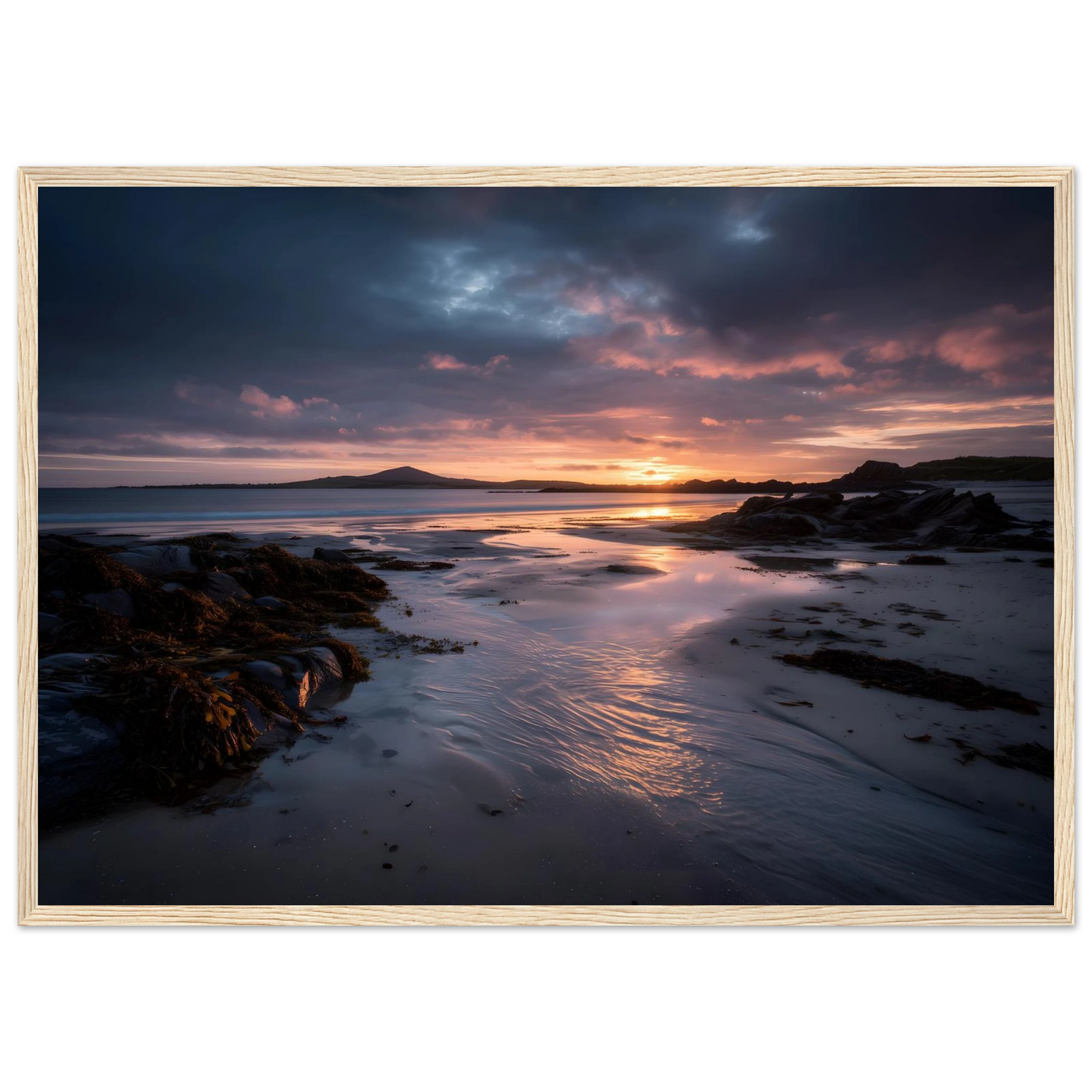 Moody seascape sunset with seaweed rocks, in a dark grey frame
