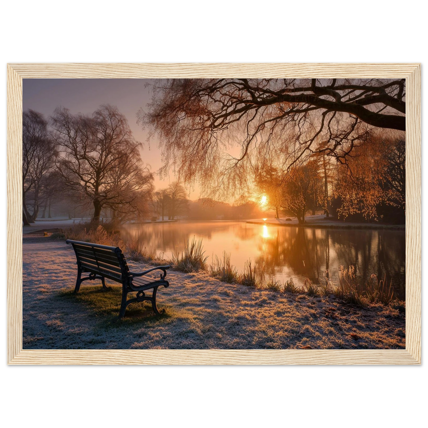 Frosted park lake at winter sunrise with an empty bench on the bank, print in a natural light wood frame