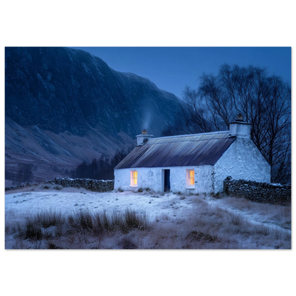Snow scene with a lit Highland croft, in a slim dark frame