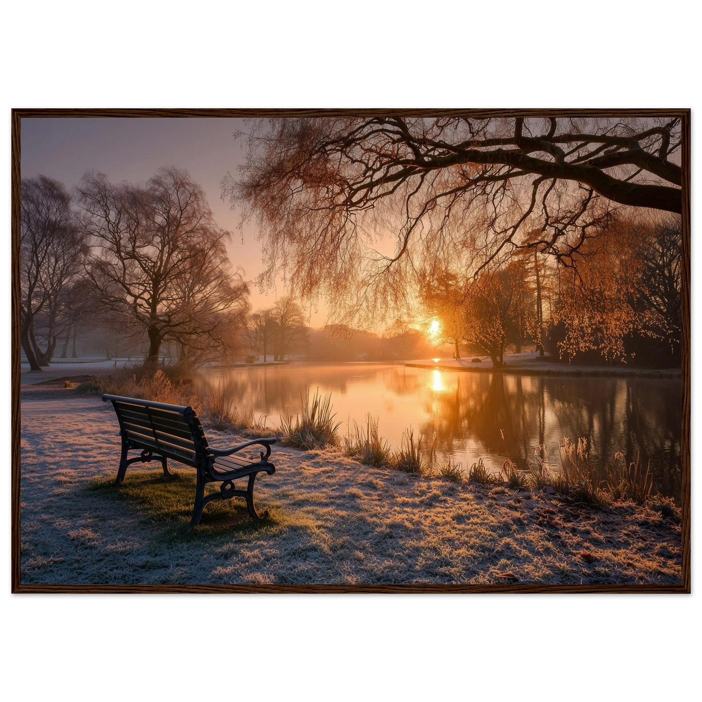 Frosted park lake at winter sunrise with an empty bench on the bank, print in a dark brown wood frame
