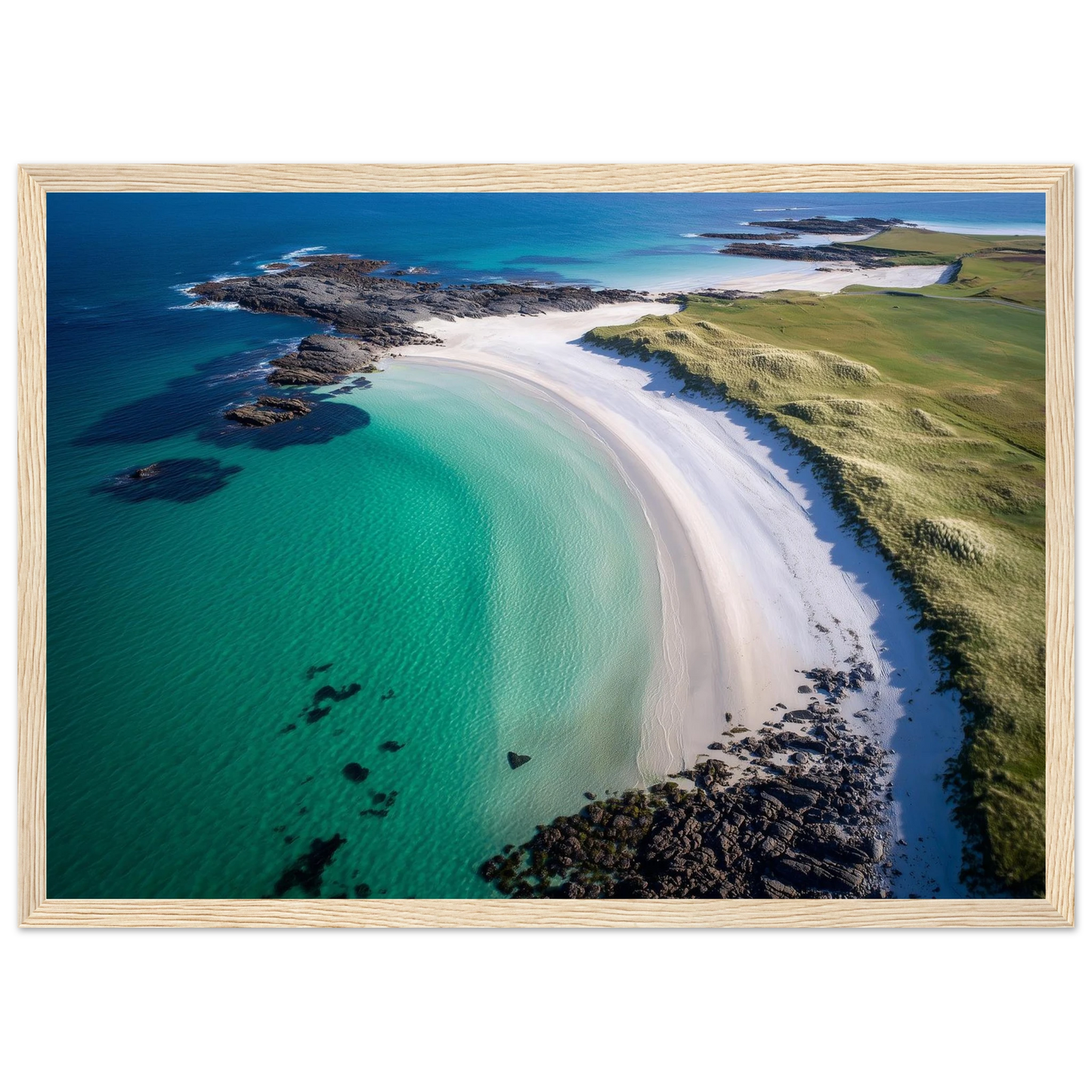 White sand beach and turquoise sea on a Scottish island, framed in light natural wood