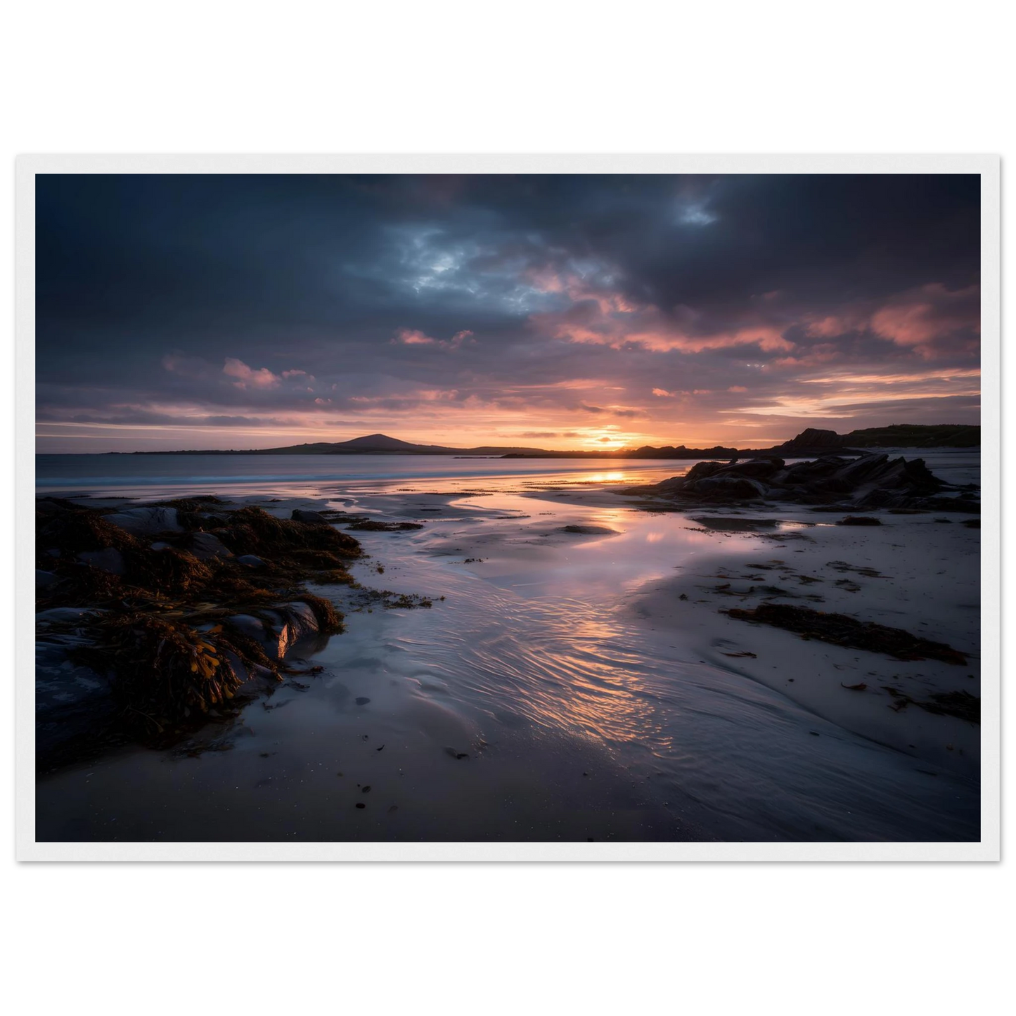 Coastal sunset seascape in a white frame with a mount