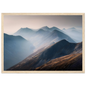 Misty mountain ridges wall art in a pale wood frame with a wide mount
