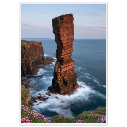 Red sandstone sea stack at last light above an Atlantic cliff coast, print in a white frame