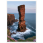 Red sandstone sea stack at last light above an Atlantic cliff coast, print in a white frame