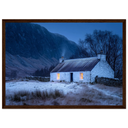 White croft under snow at blue hour, framed in dark walnut