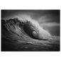 A breaking ocean wave curling into a barrel with light glowing through the lip, black and white, print in a slim dark frame