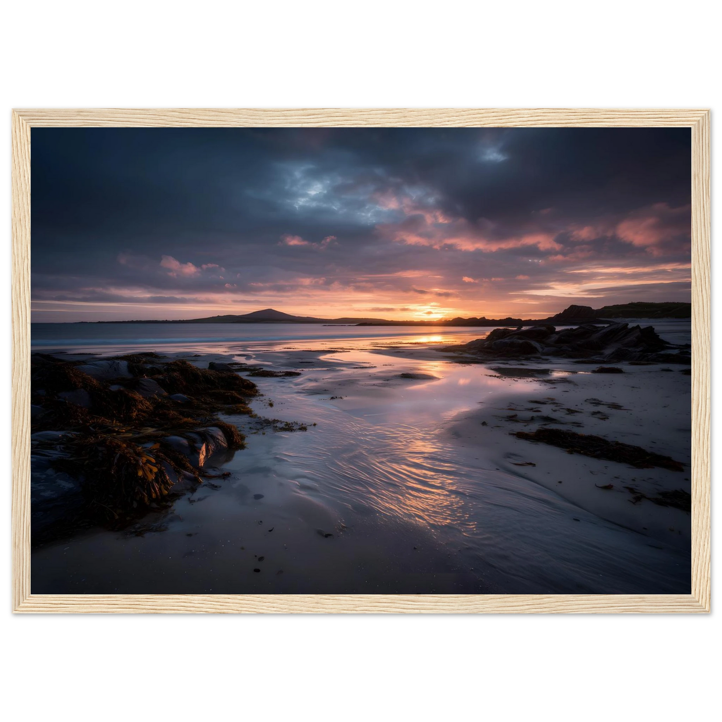 Empty beach at golden hour, poster in a light oak frame