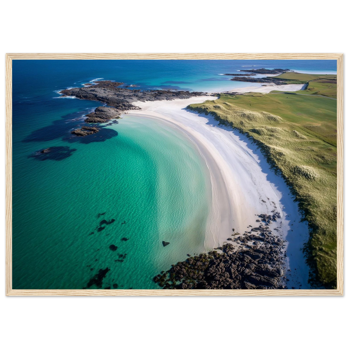 Clear turquoise water over pale sand from above, framed in light oak