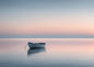 Minimalist Boat on Calm Sea