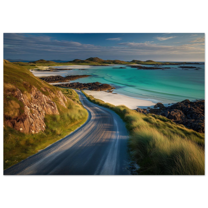 A single-track road curving above a white sand beach and turquoise Hebridean water, print in a slim dark frame