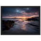 Moody seascape of a beach at last light, framed in charcoal