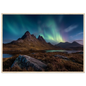 Northern lights over a dark mountain and loch, in a pale frame with a wide mount