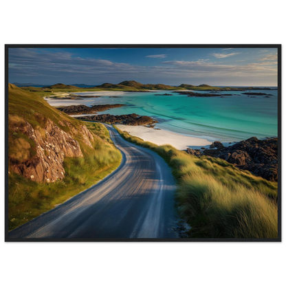 Turquoise sea and white sand beyond a coastal road, framed in charcoal