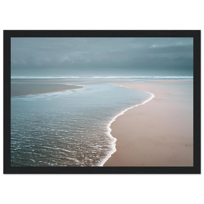 Empty beach at the water's edge, print in a black frame with a wide mount