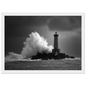 Monochrome lighthouse and storm spray, print in a white frame with a wide mount