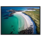 Aerial view of a white sand bay and green machair, framed in dark grey