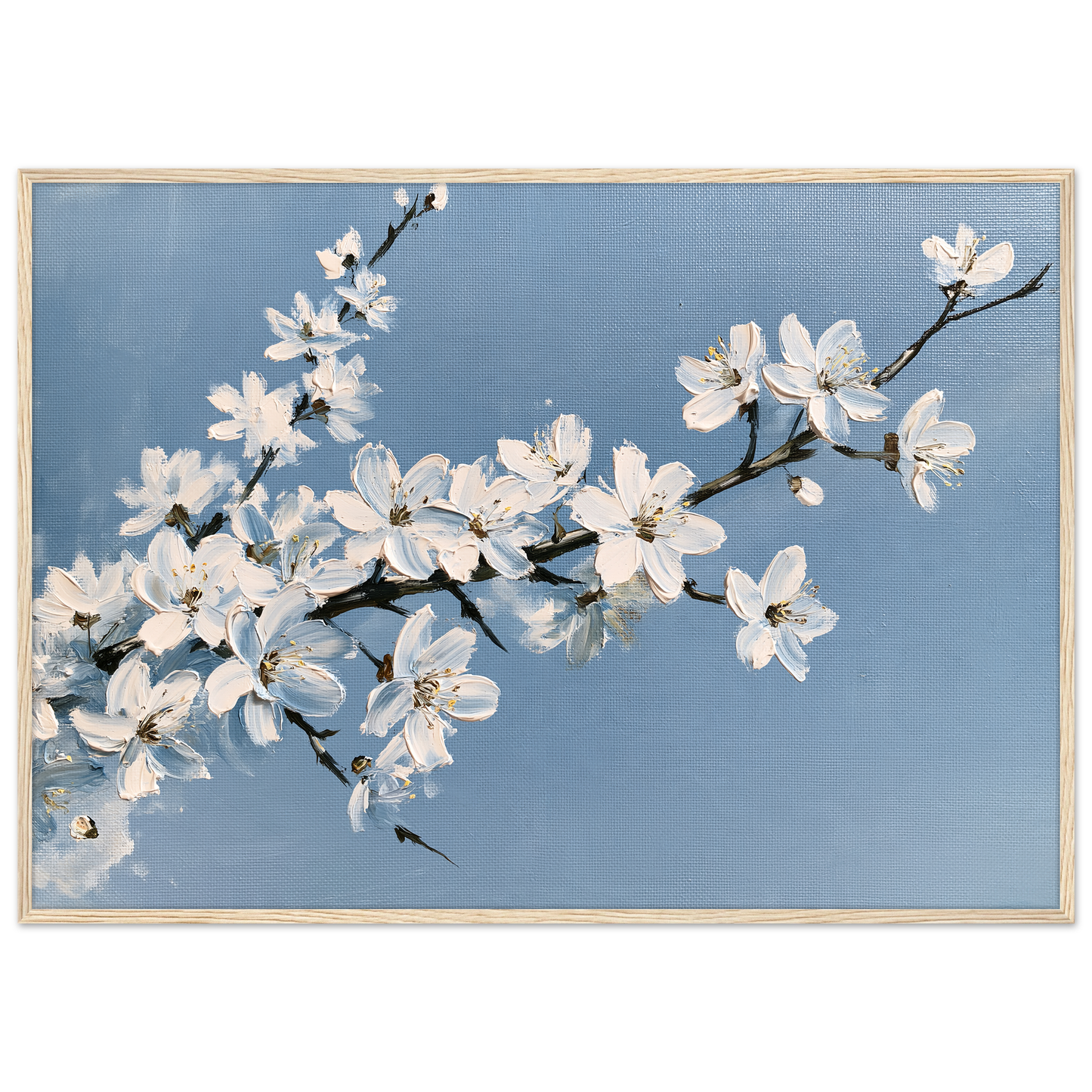 White blackthorn blossom against a pale blue sky in oil, print in a natural wood frame