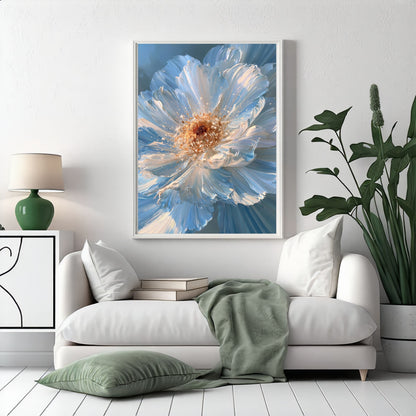Blue impasto flower, in a white frame above a white sofa with a sage green throw and floor cushion in a bright living room