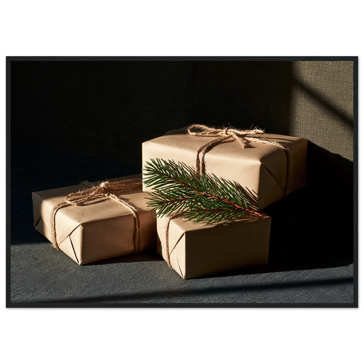 Kraft paper parcels tied with jute twine and spruce, print in a black frame