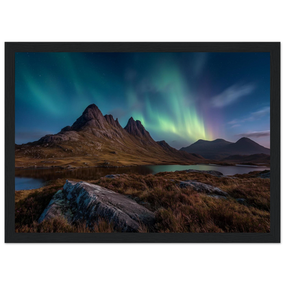 Mirrie Dancers over a dark Highland peak, framed in charcoal