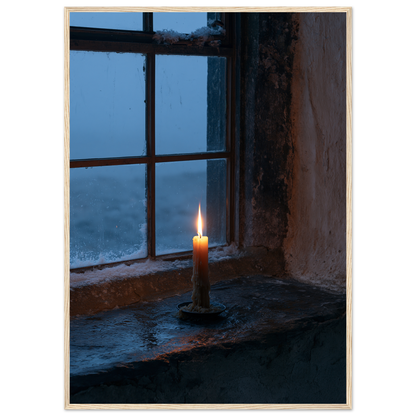Candle burning on a stone windowsill at blue dusk, print in a natural wood frame