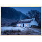 Whitewashed cottage in a snowy glen, framed in pale natural wood