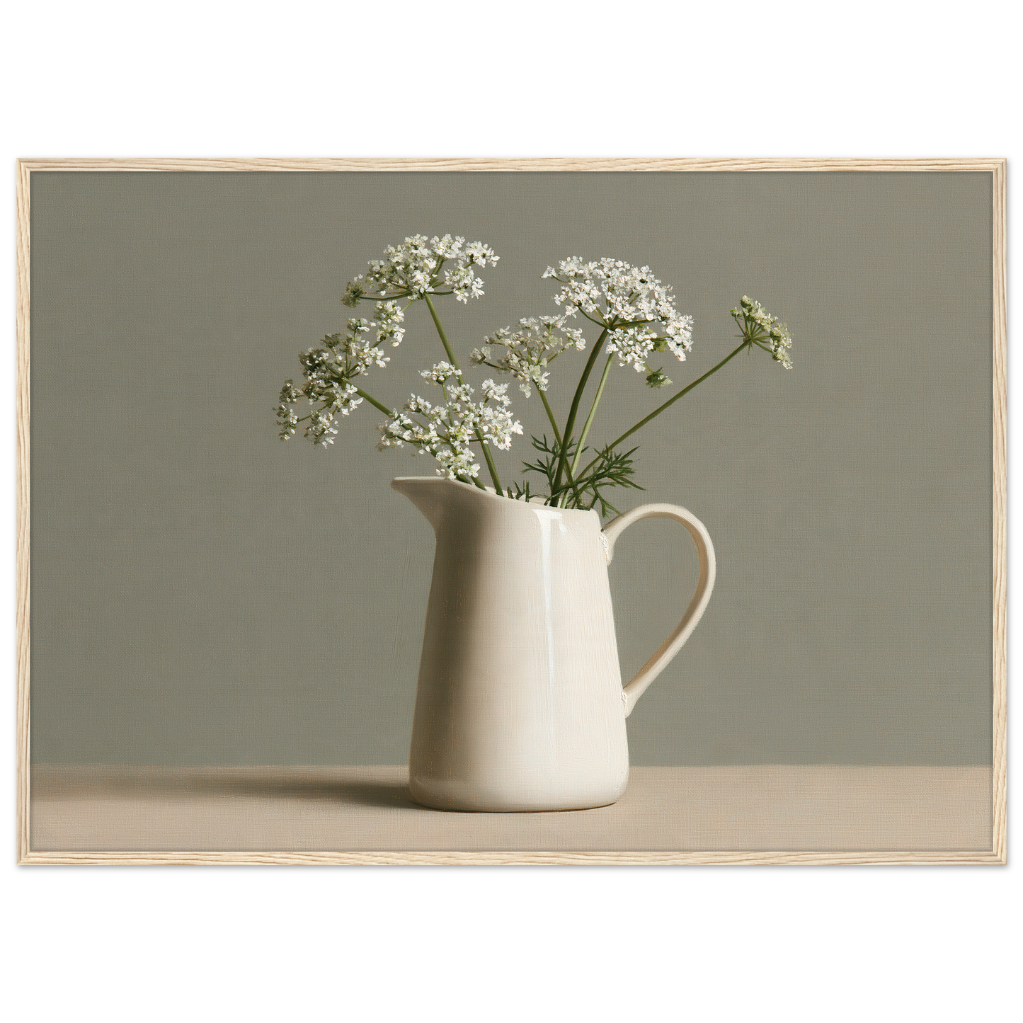 White cow parsley in a cream jug against a soft sage wall, print in a natural wood frame