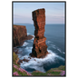 Red sandstone sea stack at last light above an Atlantic cliff coast, print in a black frame