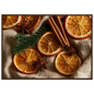 Dried oranges, cinnamon and star anise on linen, print in a dark wood frame