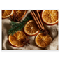 Dried oranges, cinnamon and star anise on linen, print in a white frame